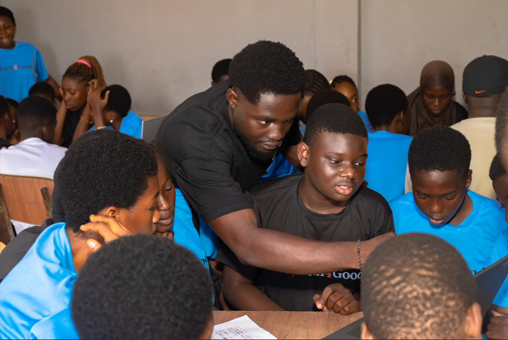 Calvin teaching a group of students