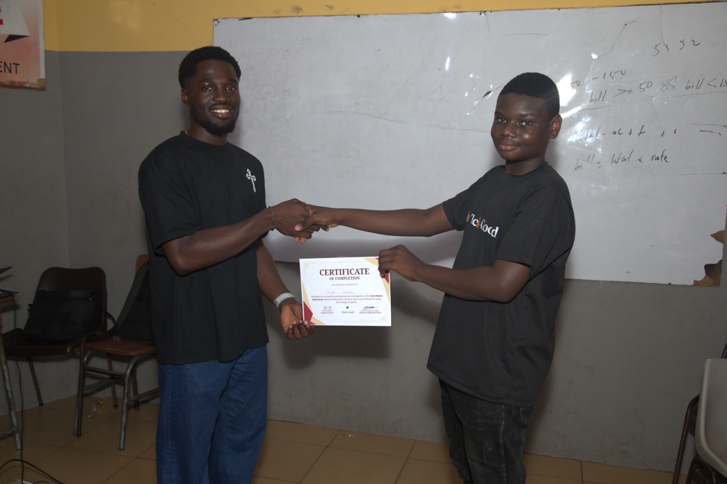Student receiving certificate